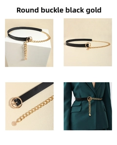 Detail of black leather and gold chain layered belt with round buckle on a green blazer