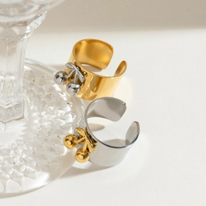 Two adjustable stainless steel cherry rings in gold and silver polished metal finishes
