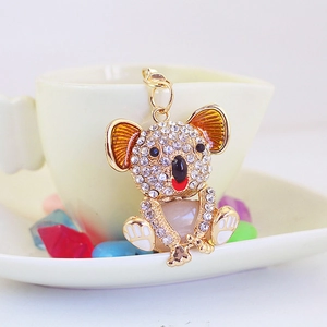 Cute golden koala keychain featuring opal-style details and sparkling rhinestones