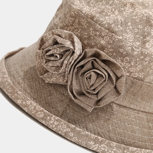 Breathable cotton linen sun hat for elderly women with white floral print and fabric flower