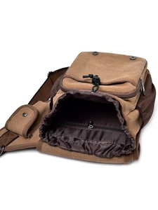 Brown canvas messenger bag with drawstring closure and multiple storage compartments