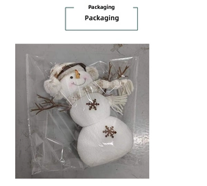 Detailed view of a white plush Christmas snowman doll in a transparent OPP plastic bag