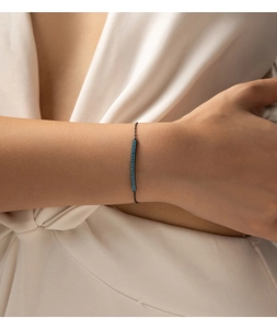 Close-up of S925 silver black chain bracelet featuring micro-pave turquoise stones