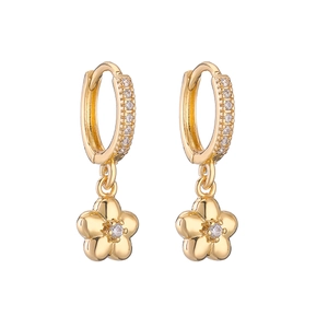 Elegant gold flower drop huggie earrings with cubic zirconia stones on white background