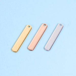 Minimalist stainless steel bar pendants in gold, rose gold, and silver finishes