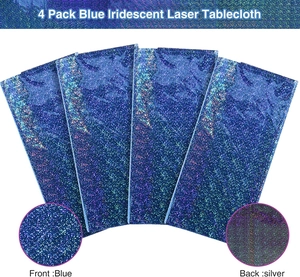 Detail view of iridescent laser tablecloth showing blue front and silver back textures