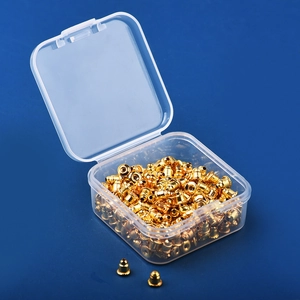 Gold-plated metal earring back stoppers in a clear storage box for DIY jewelry making