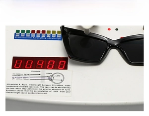 Retro oversized square sunglasses shown under professional UV400 protection testing