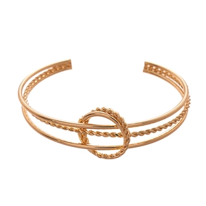Minimalist three-layer geometric gold cuff bracelet with twisted rope metal details