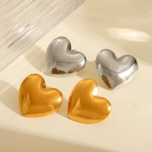 Polished 18K gold and silver puffed heart stud earrings made of stainless steel