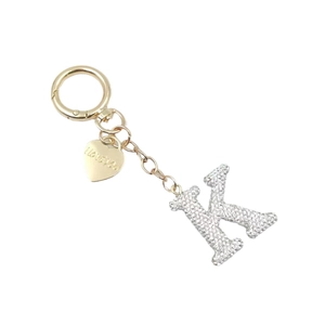 Golden keychain featuring sparkling rhinestone letter K and I Love You heart charm