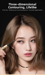 Detail view of ultra-fine double-headed eyebrow pencil with precise tip and gold finish