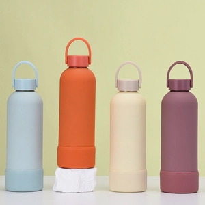 Detail of insulated water bottles with carry handles and protective silicone bases