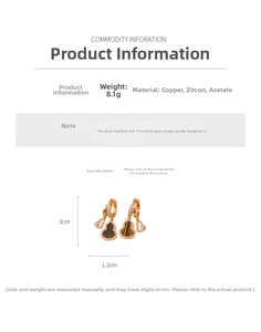 Detailed view of gourd-shaped earrings with zircons and tiger-eye texture inserts