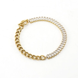 Detail of 18K gold stainless steel bracelet with rectangular crystals and toggle clasp