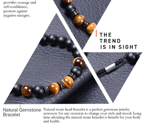 Detailed view of tiger eye and matte onyx beads with micro-paved zircon spacers