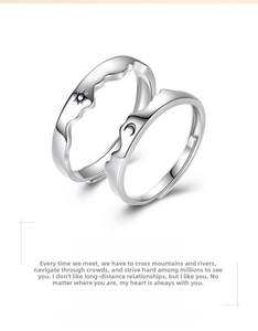 Detail view of silver adjustable sun and moon rings showing polished S925 sterling silver