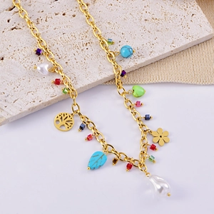 Gold titanium necklace with pearls, turquoise, tree of life, and floral charms