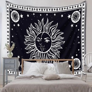 Detailed view of sun and moon mandala tapestry on a modern bedroom headboard wall
