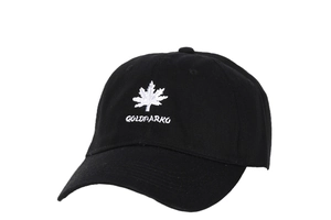 Detail of white maple leaf and GOLDPARKO embroidery on a black cotton baseball cap