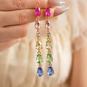 Colorful tiered teardrop tassel earrings with vibrant rhinestones and gold metal base
