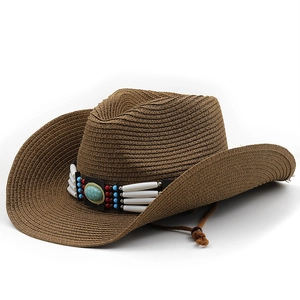 Close-up of woven straw sun hat detailing ethnic beaded band with turquoise stone