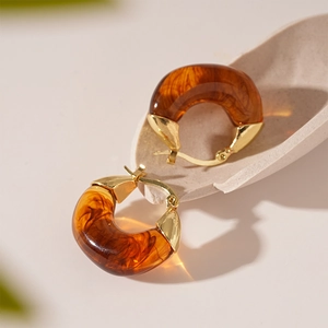 Vintage amber resin and gold U-shaped hoop earrings with a tortoiseshell texture for women