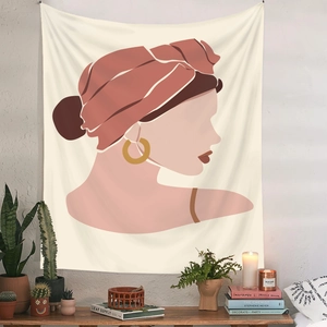 Minimalistischer Boho-Wandteppich mit abstraktem Frauenporträt an einer weißen Wand