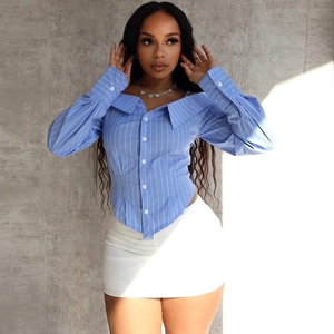 Close-up of blue and white striped off-shoulder blouse with white mini skirt
