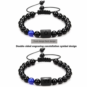 Double-sided engraved Taurus obsidian beaded bracelet with gold zodiac symbol for couples