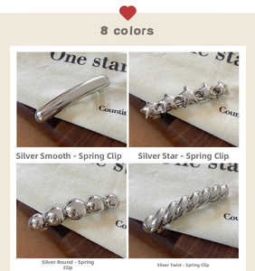 Detail of silver-finish alloy hairpins with smooth, star, bead, and twist textures