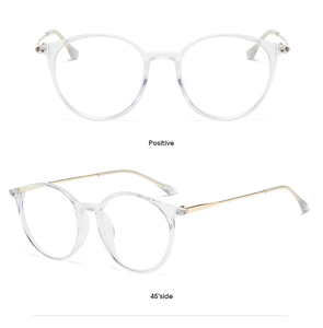 Front and 45-degree side macro view of round clear frame glasses with gold metal temples