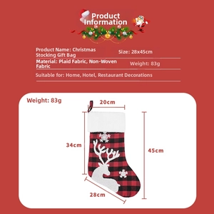 Detail view of red plaid Christmas stocking with reindeer embroidery and 45cm size marking