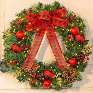 Detail of Christmas wreath battery box showing 9 LED light modes and functional instructions