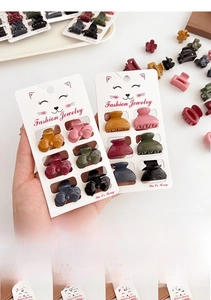 Detailed set of Morandi color mini hair claws in various styles on display cards