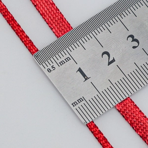 4mm red metallic woven Christmas ribbon with ruler measurement showing width