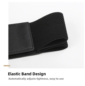 Detail of black elastic waist belt with high stretch fabric and leather end