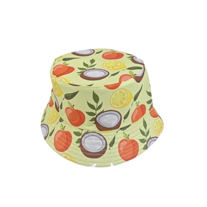 Detailed close-up of a bucket hat featuring tropical fruit prints like coconut and lemon