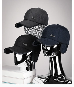Three men's winter baseball hats with ear flaps in grey, navy, and black colors