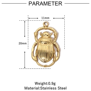 Detail of 14k gold beetle pendant showing 20mm height and stainless steel material