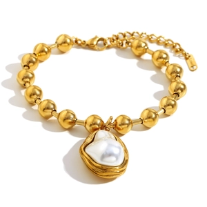 18K gold plated stainless steel bead bracelet featuring a baroque pearl pendant