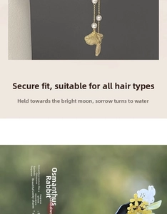 Macro detail of sandalwood hair pin with pearl, golden ginkgo leaf and rabbit pendant