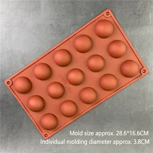 Macro view of 15-cavity semi-sphere silicone mold with dimensions 28.6x16.6cm for chocolate