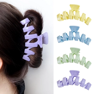 Grandes pinces à cheveux ondulées en couleurs pastel macaron avec fini mat