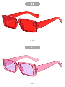 Detailed 45-degree side view of oversized rectangular sunglasses in red and pink frames
