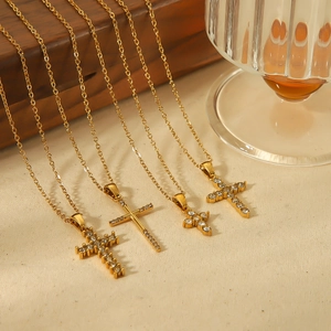 Set of four 18k gold plated stainless steel cross pendants with sparkling crystals