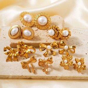 Vintage floral and geometric stainless steel earrings with pearls in gold finish