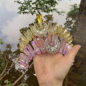 Detail of bohemian crystal headband with hollow moon ornament and pink raw crystals
