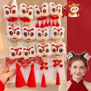 Traditional Chinese New Year lion dance plush hair clips with long red tassels and bells
