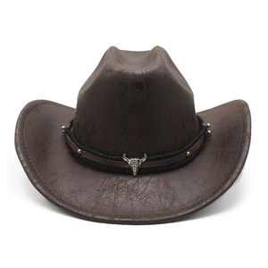 Close-up of vintage brown leather cowboy hat with bull skull and metal rivet details